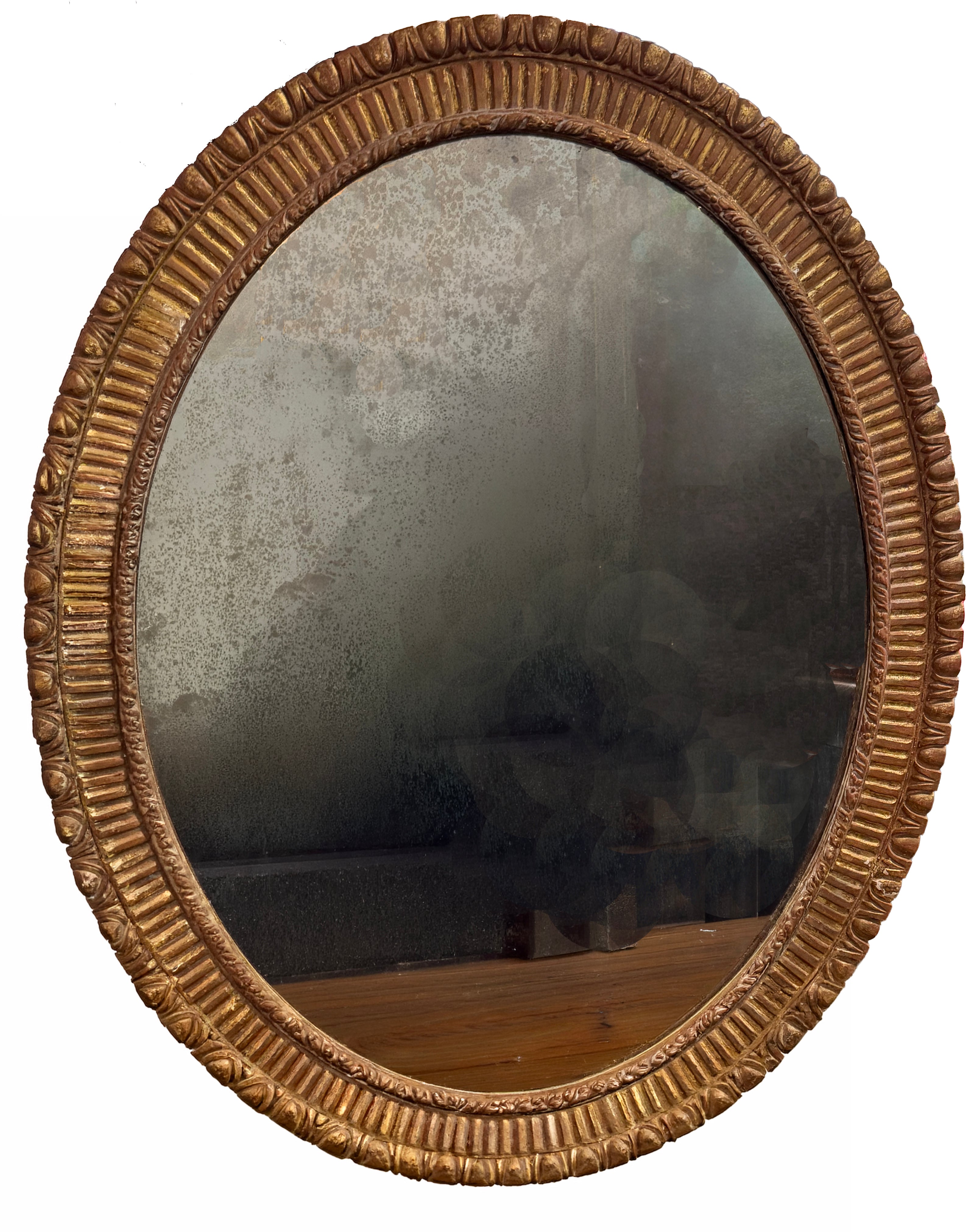 A George III Style Carved Giltwood Oval Mirror