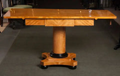 A Handsome Biedermeier Satinwood Sofa Table