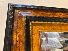 Dutch Baroque Style Ebonized Gilt Ripple Mold Framed Mirror with Beveled Glass