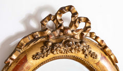 18th Century Italian Rococo Gilt Wood Oval Mirror
