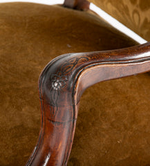 A Pair of French Carved Walnut Louis XIV Armchairs