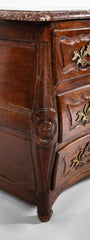 A French 18th Century Marble Top Walnut Commode