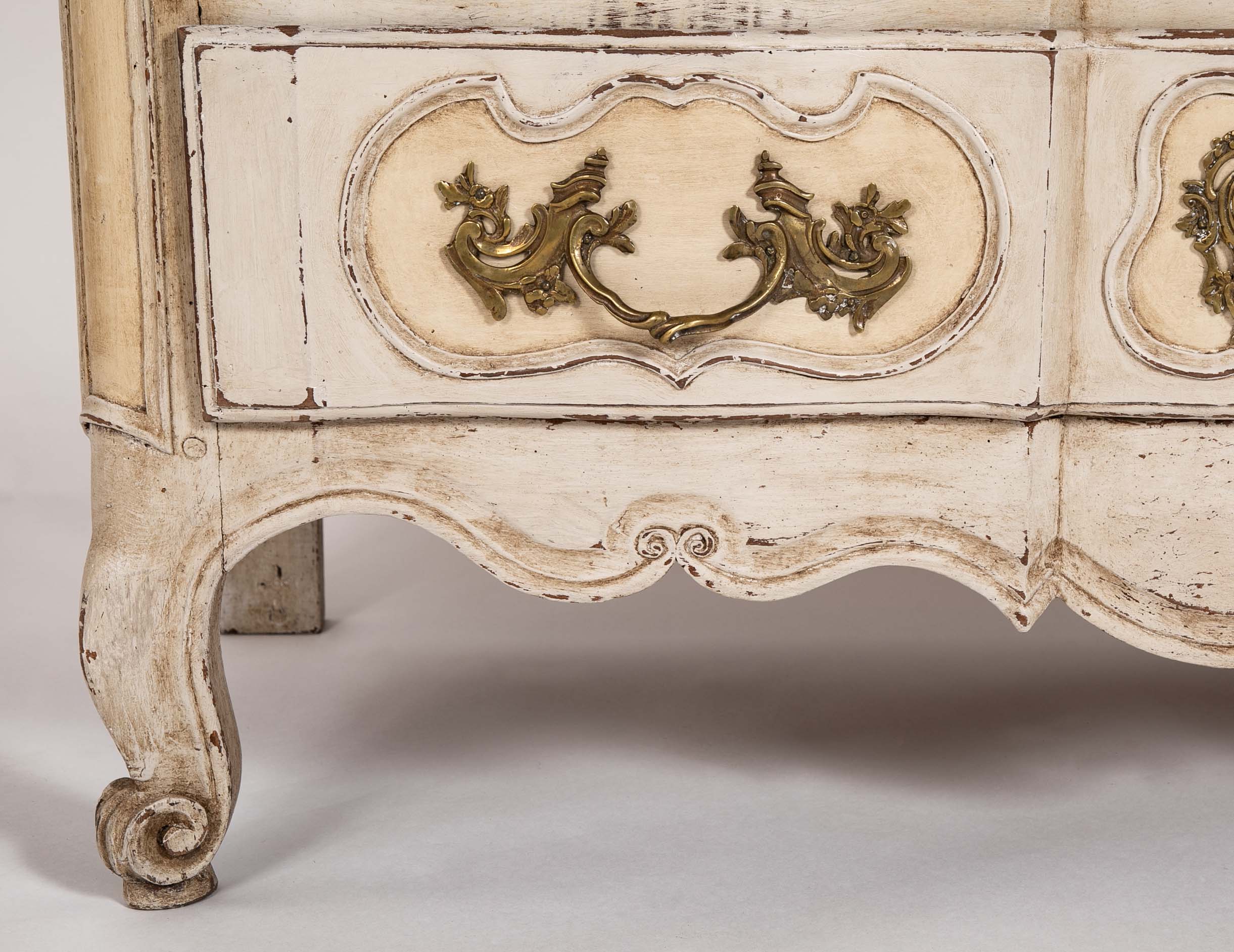 An 18th Century Robust French Provincial Serpentine Front Commode
