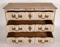 An 18th Century Robust French Provincial Serpentine Front Commode