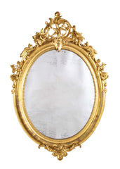 An 18th Century French Carved & Gilt Oval Mirror
