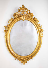 An 18th Century French Carved & Gilt Oval Mirror
