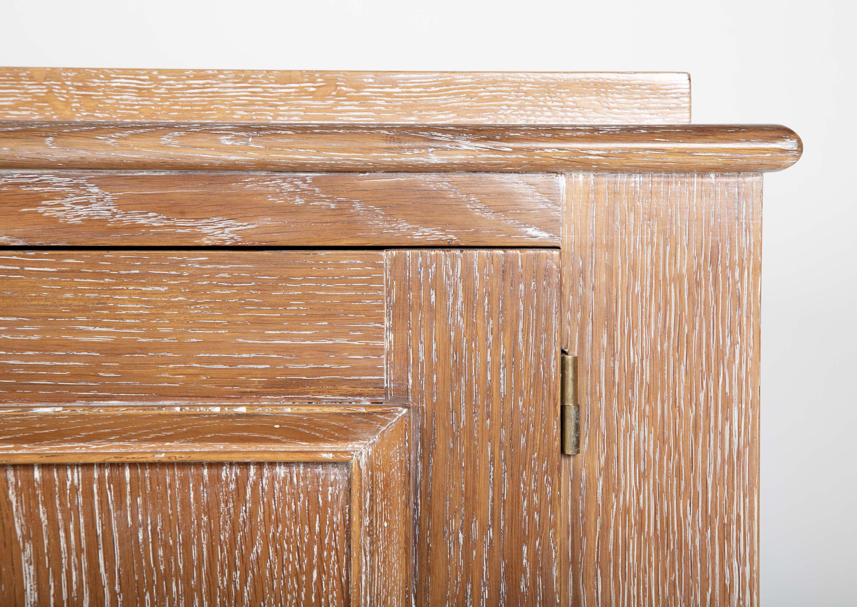 A Cerused Oak Credenza in the Manner of Andre Arbus