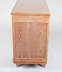 A Cerused Oak Credenza in the Manner of Andre Arbus