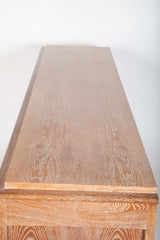 A Cerused Oak Credenza in the Manner of Andre Arbus