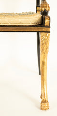 A Pair of Regency Style Ebonized and Parcel Gilt Armchairs