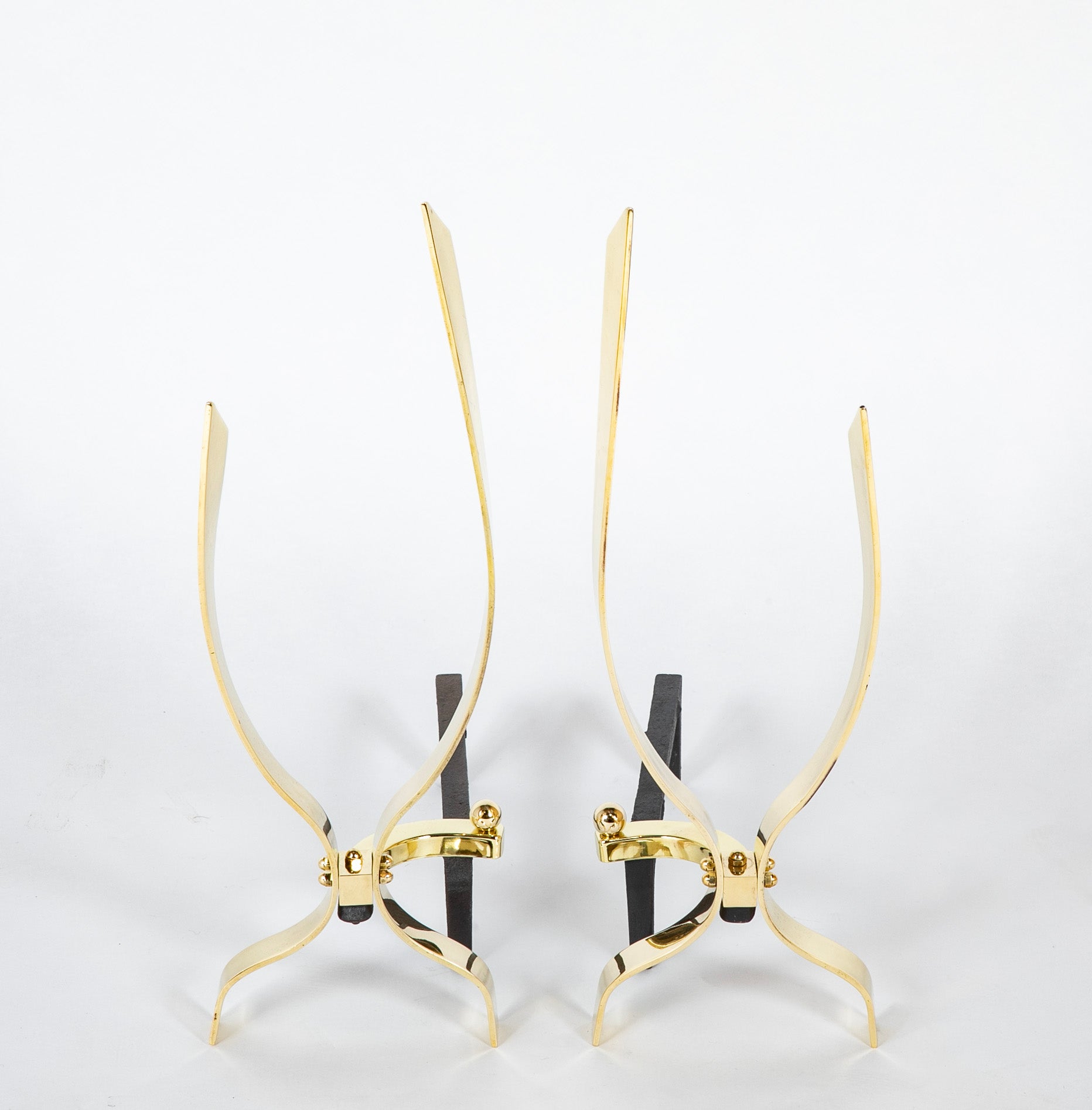 Pair of Heavy Polished Brass Andirons in the Manner of Donald Deskey
