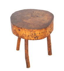 A Rustic Tripod Form Side Table with Tree Cross Section as Top