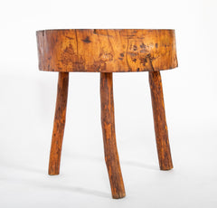 A Rustic Tripod Form Side Table with Tree Cross Section as Top