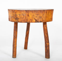 A Rustic Tripod Form Side Table with Tree Cross Section as Top