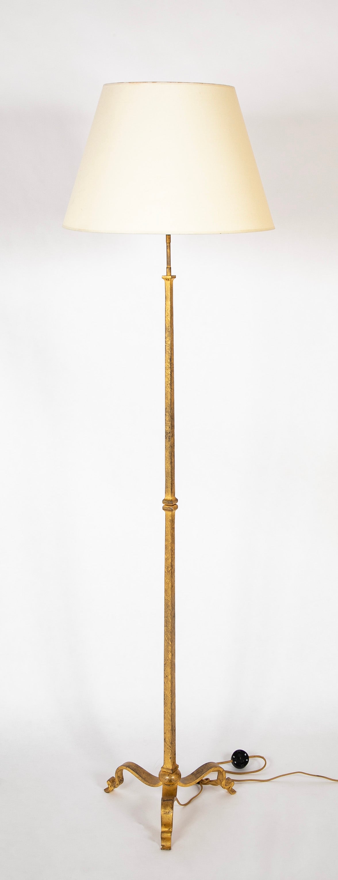 A Pair of Gilt Iron Floor Lamps