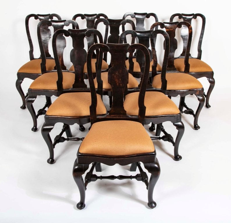 A set of 10 Queen Anne Black Painted Dining Chairs