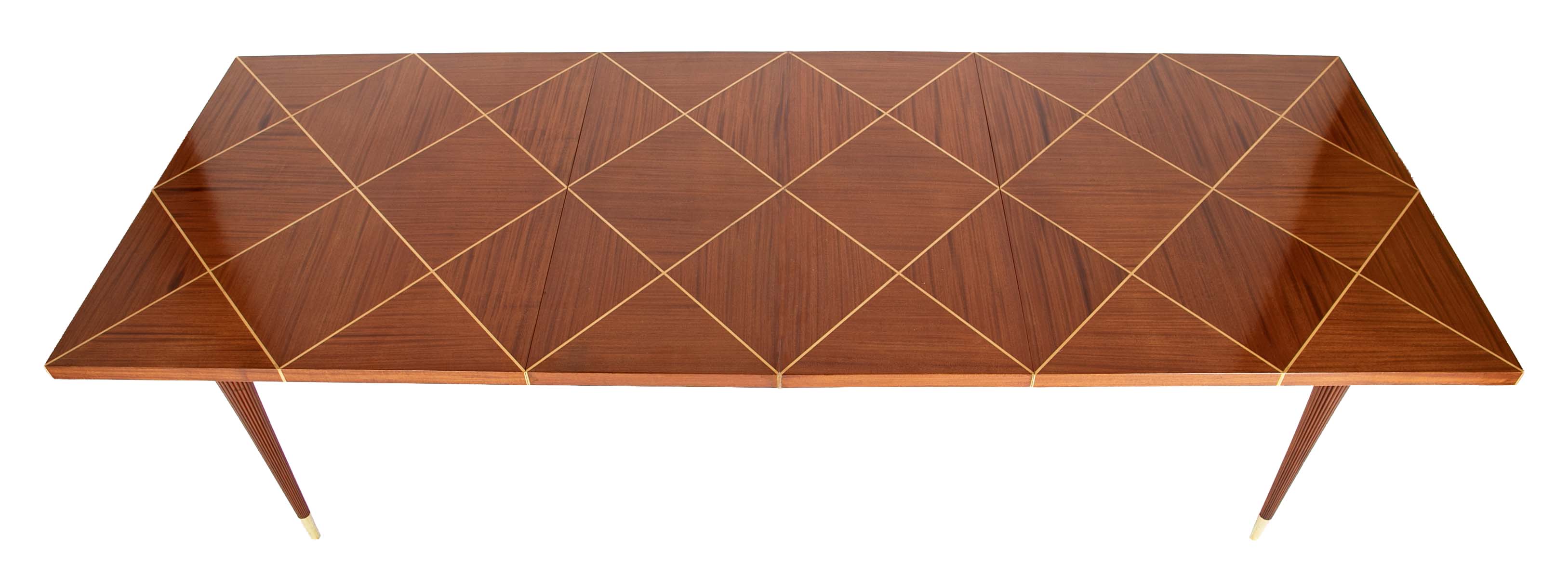 A Tommi Parzinger For Charak Modern Mahogany and Maple Dining Table With Leaves.