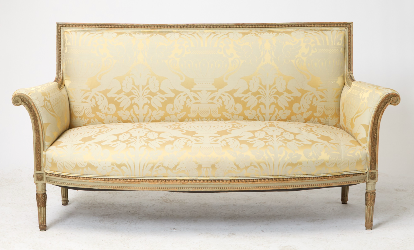Louis XVI Upholstered Painted and Parcel Giltwood Settee