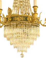 A Crystal and Gilt and Patinated Bronze Empire Style Chandelier
