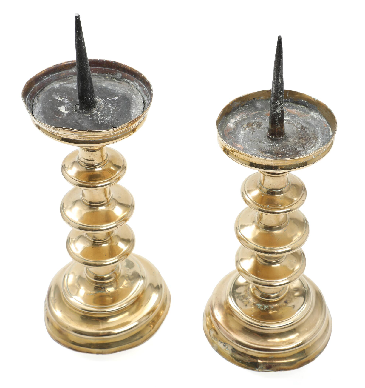 Pair of Gothic Circa 1580–1600 Patinated Brass Altar Candlestick Holders, Baluster Shaped Stem on Round Base, Presumably Friesland