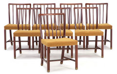 A Set of Eight Danish Mahogany and Brass Dining Chairs