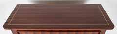 A Three Drawer Rosewood Commode in the Manner of Jacques Adnet