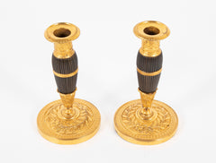 A Pair of Early 19th century French Gilt & Patinated Bronze Candlesticks