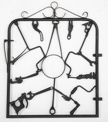 A Garden Gate in Wrought Iron with Antique Farm Tools by Rodney Rosebrook
