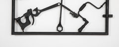 A Garden Gate in Wrought Iron with Antique Farm Tools by Rodney Rosebrook