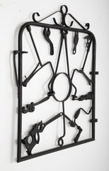 A Garden Gate in Wrought Iron with Antique Farm Tools by Rodney Rosebrook