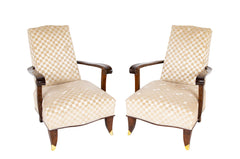 A Pair of French Upholstered Mahogany Armchairs with Scrolled Hand Grips & Bronze Sabots