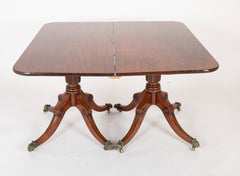 A Two Pedestal English Regency Mahogany Dining table