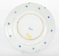 A Delft Blue & white Charger Depicting Blossoms from a Rock