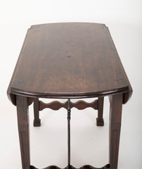 Spanish Baroque Walnut Drop Leaf Table with Wrought Iron Stretchers