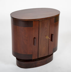 An Oval Shaped Mahogany Bar Cabinet