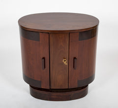 An Oval Shaped Mahogany Bar Cabinet