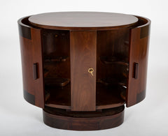 An Oval Shaped Mahogany Bar Cabinet