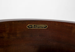 An Oval Shaped Mahogany Bar Cabinet