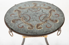 A Round Wrought Iron & Eglomise Coffee Table