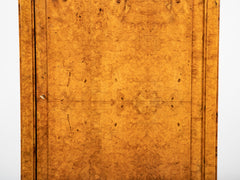 A French Burlwood Cabinet on Bronze Sabots