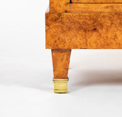 A French Burlwood Cabinet on Bronze Sabots