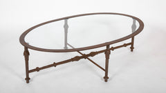 A Mid-Century Iron and Glass Oval Coffee Table
