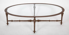 A Mid-Century Iron and Glass Oval Coffee Table