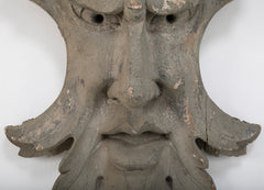 Carved and Painted Wood Architectural Element in the Form of a Mask