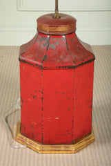 A Chinese Black & Gilt on Red Decorated Tole Octagonal Cannister with Figure