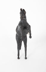 An Argentine Leather Clad Wood Horse