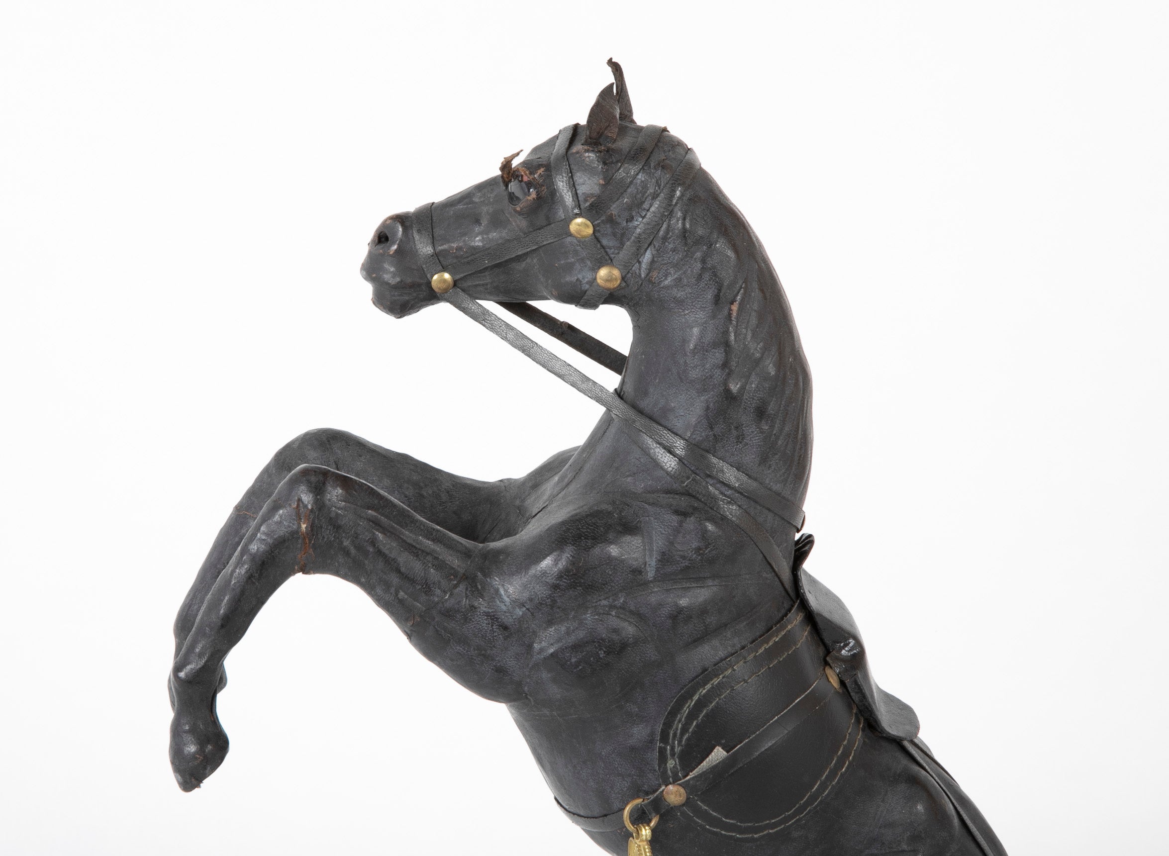 An Argentine Leather Clad Wood Horse