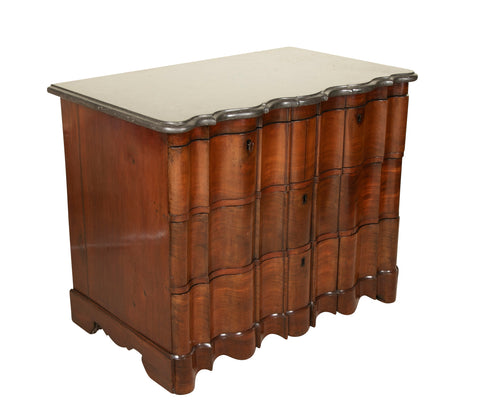 A Handsome Baroque Four Drawer Walnut Chest with Original Shaped Marble Top