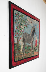 An Exceptional American Hooked Rug Depicting a Boy Feeding an Apple to a Horse