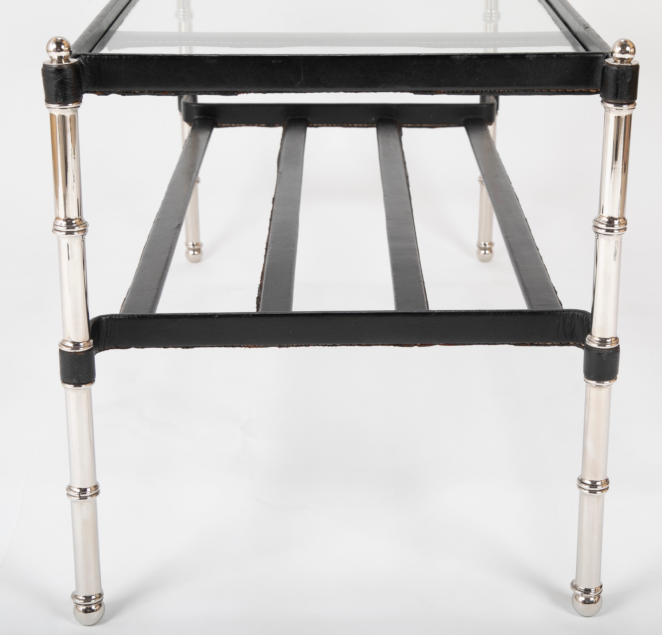 A Black Leather Wrapped and Chrome Jacques Adnet Glass Top Coffee Table